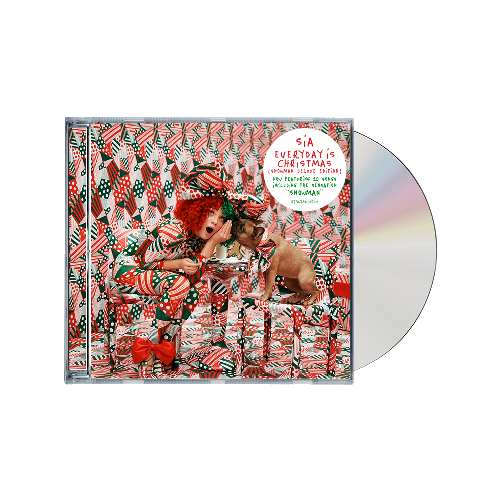 CD album cover for Sia’s ’Everyday Is Christmas’ featuring a festive, colorful design with a person and dog amid Christmas-themed patterns.