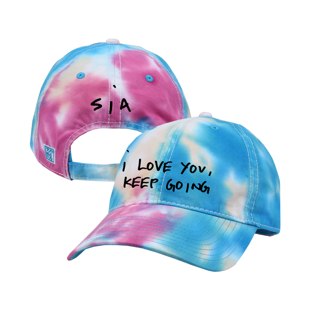 Tie-dye baseball cap with ’SIA’ on the back and ’I LOVE YOU, KEEP GOING’ on the front.